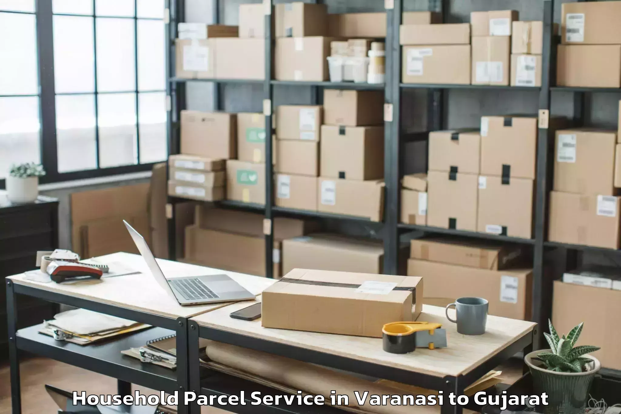 Book Your Varanasi to Netrang Household Parcel Today